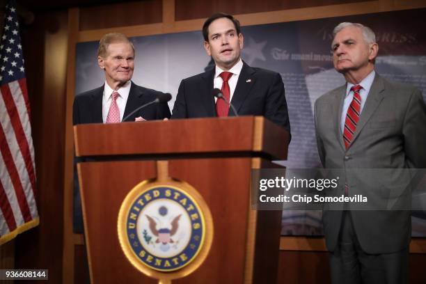 Sen. Bill Nelson , Sen. Marco Rubio and Sen. Jack Reed talk about their bipartisan legislation to create "red flag" gun laws during a news conference...