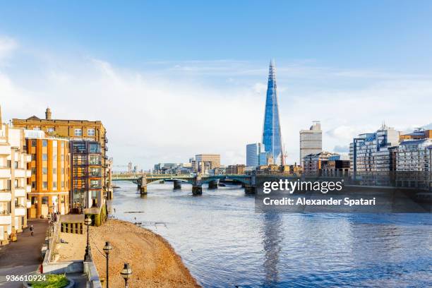 london skyline with the shard skyscraper, london bridge and thames river, england, uk - london skyline river thames stock pictures, royalty-free photos & images