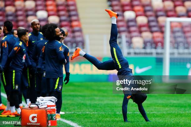 Dani Alves of Brazil attends a training session ahead of a friendly match between Russia and Brazil within the 2018 FIFA World Cup preparations at...