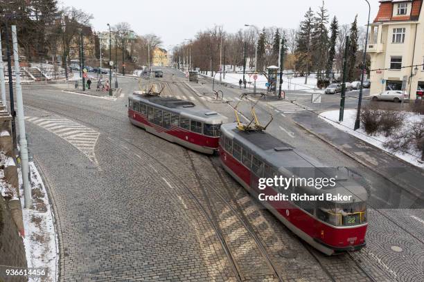 New style number 20 tram drives over a cobbled road, on 18th March in Prague, the Czech Republic.