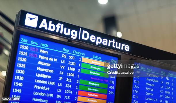 departure board at zurich airport - zurich airport stock pictures, royalty-free photos & images