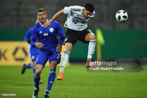 Nadiem Amiri of Germany is challenged by Yosef Raz Meir of Israel during the 2019 UEFA Under21 European Championship qualifier match between U21...