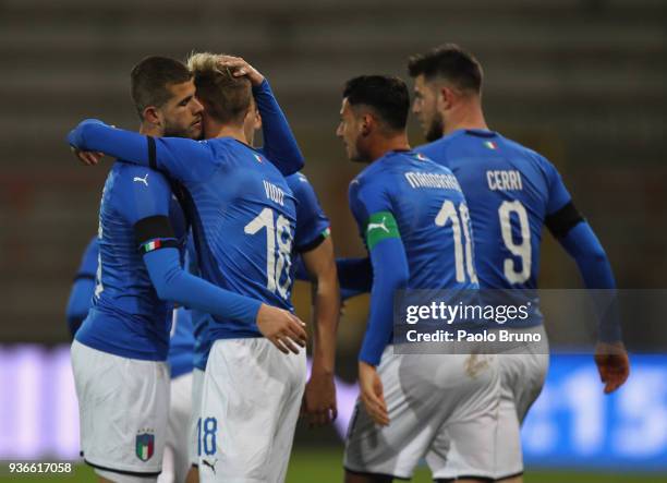 Luca Vido with his teammates of Italy U21 celebrates after scoring the team's first goal during the international friendly match between Italy U21...