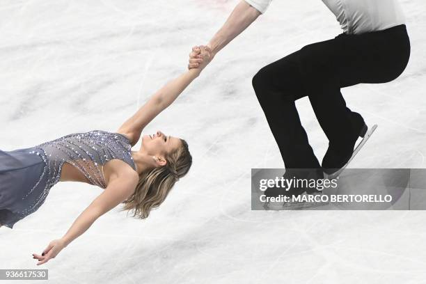 Canada's Kirsten Moore-Towers and Michael Marinaro perform during the Pairs Free Skate program at the Milano World League Figure Skating Championship...