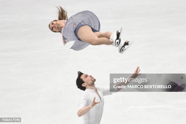 Canada's Kirsten Moore-Towers and Michael Marinaro perform during the Pairs Free Skate program at the Milano World League Figure Skating Championship...