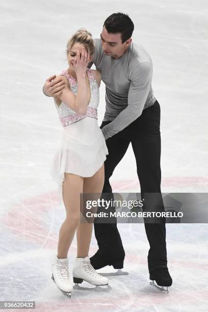 S Alexa Scimeca Knierim and Chris Knierim react as they perform during the Pairs Free Skate program at the Milano World League Figure Skating...