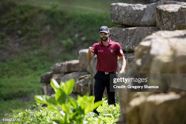 Adam Hadwin of Canada plays a shot from a hazard on the fourth hole during the second round of the World Golf Championships-Dell Match Play at Austin...