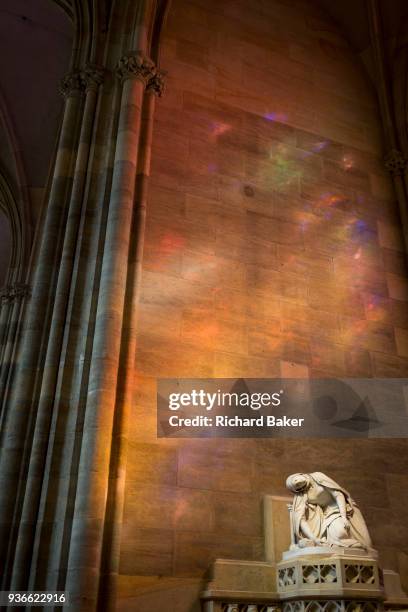 Spectrum of coloured light from stained glass in the nave of St Vitas' Cathedral in Prague Castle, on 18th March in Prague, the Czech Republic. The...