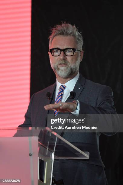 Darren Tulett answers journalists during a press conference at hipppdrome de Paris Longchamps racetrack at Paris Longchamp on March 22, 2018 in...