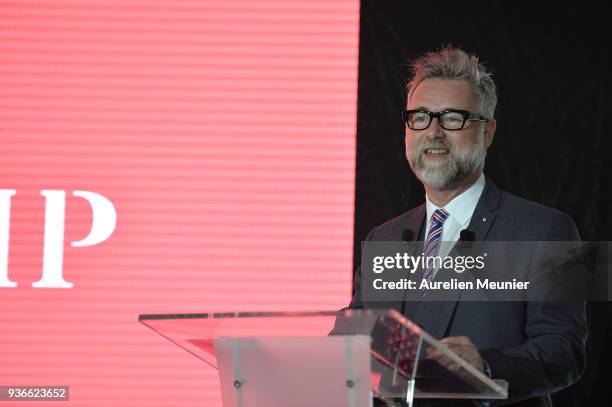 Darren Tulett answers journalists during a press conference at hipppdrome de Paris Longchamps racetrack at Paris Longchamp on March 22, 2018 in...