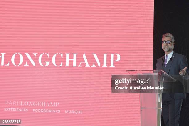 Darren Tulett answers journalists during a press conference at hipppdrome de Paris Longchamps racetrack at Paris Longchamp on March 22, 2018 in...