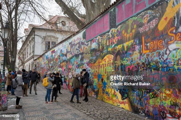 The John Lennon Memorial Wall in Velkoprevorske namesti, Malá Strana, on 18th March in Prague, the Czech Republic. The Lennon Wall or John Lennon...