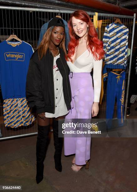 Sarah Mulindwa and Victoria Clay attend the Wrangler Revival Blue & Yellow event at Poland Street Car Park on March 22, 2018 in London, England.