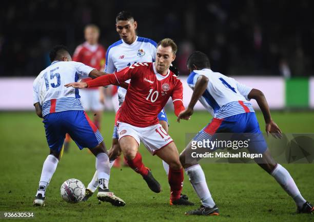 Christian Eriksen of Denmark is challenged by Eric Davis and Fidel Escobar of Panama during the International Friendly match between Denmark and...