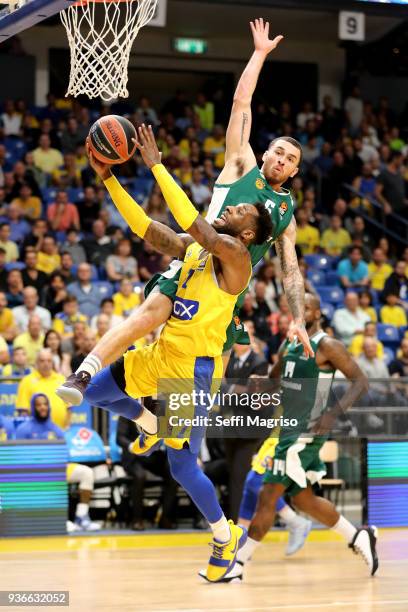 Deandre Kane, #7 of Maccabi Fox Tel Aviv competes with Mike James, #5 of Panathinaikos Superfoods Athens during the 2017/2018 Turkish Airlines...