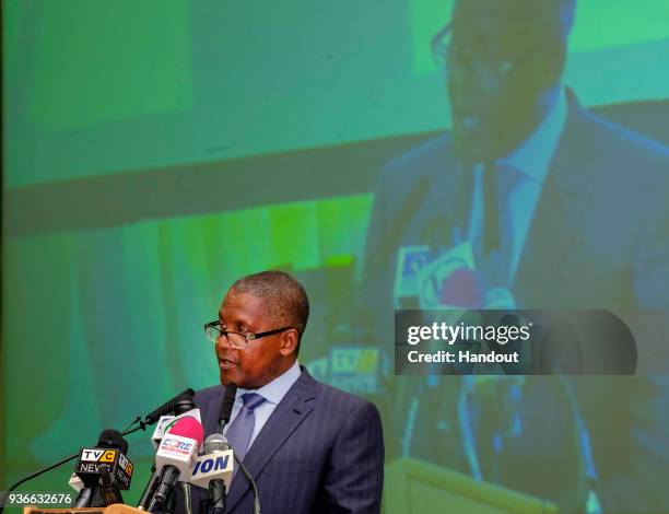 In this handout image provided by the Gates Archive, Alhaji Aliko Dangote, President & CEO Dangote Group, speaks to the National Economic Council at...