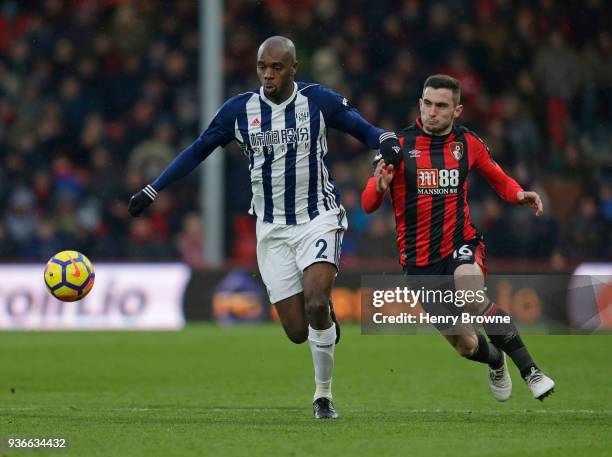 Allan Nyom of West Bromwich Albion and Lewis Cook of Bournemouth compete for the ball during the Premier League match between AFC Bournemouth and...