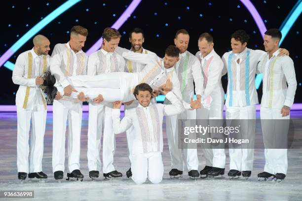 Back row - Alex Beresford, Mark Hanretty, Sylvain Longchambon Dan Whiston, Lukasz Rozycki, Max Evans and Ray Quinn hold Jake Quickenden over Kem...