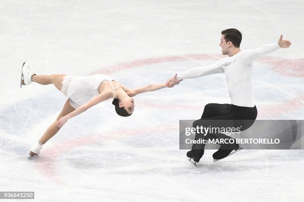 Russia's Natalia Zabiiako and Alexander Enbert perform on March 22, 2018 during the Pairs Free figure skating at the Milano World League Figure...