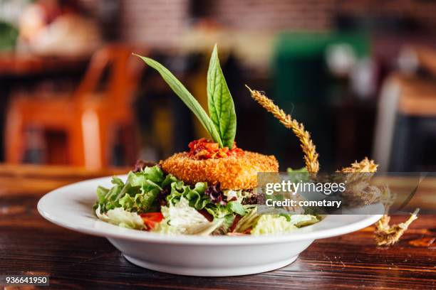 salad with goat cheese - chevre animal stock pictures, royalty-free photos & images