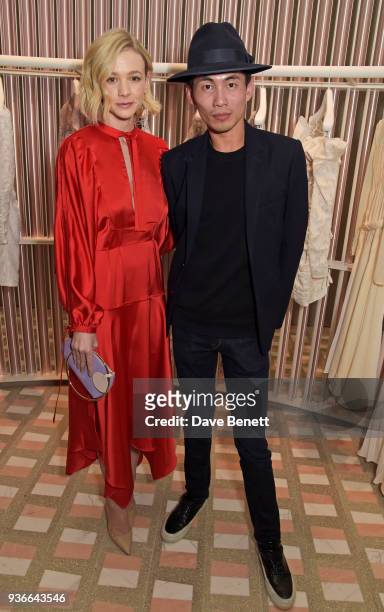 Carey Mulligan and Han Chong, Self-Portrait Founder and Creative Director, attend the Self-Portrait store opening cocktail party on March 22, 2018 in...