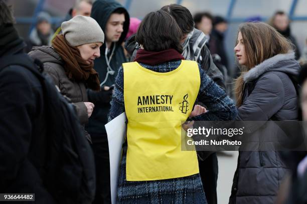 Members of Amnesty International are seen collecting signatures against the proposed abortion law in Warsaw, Poland on March 22, 2018. The proposed...