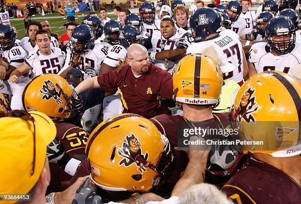 The Arizona State Sun Devils and the Arizona Wildcats come together in a scrum following the college football game at Sun Devil Stadium on November...