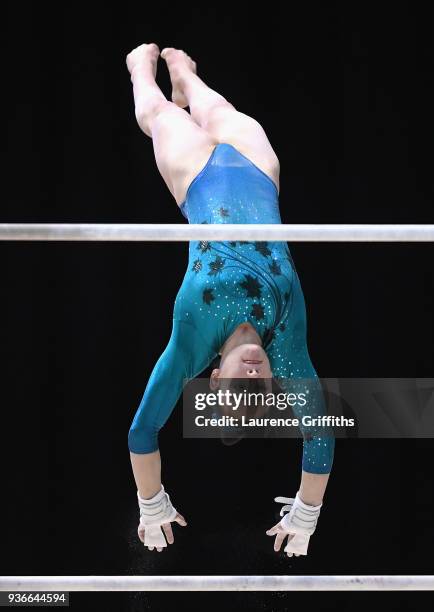 Hannah Chrobok of Canada competes on the unevan bars during day two of the 2018 Gymnastics World Cup at Arena Birmingham on March 22, 2018 in...