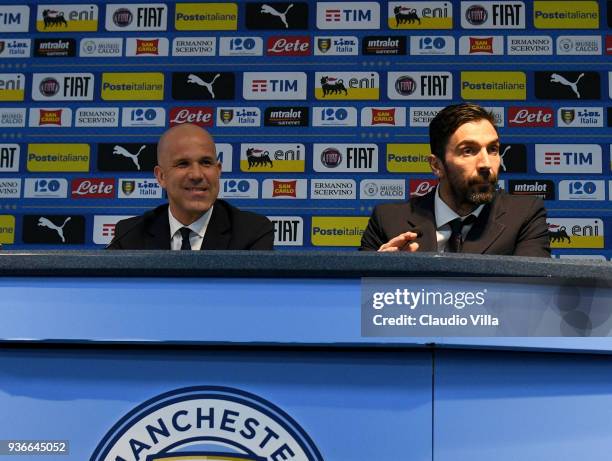 Head coach Italy Luigi Di Biagio and Gianluigi Buffon of Italy speak with the media during a press conference at Etihad Stadium on March 22, 2018 in...