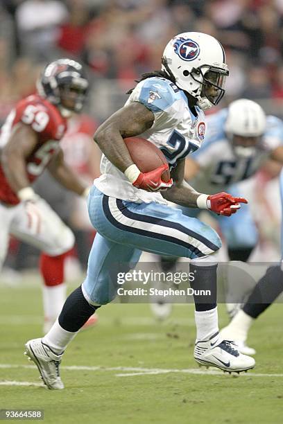 Running Back Chris Johnson of the Tennessee Titans carries the ball against the Houston Texans on November 23, 2009 at Reliant Stadium in Houston,...