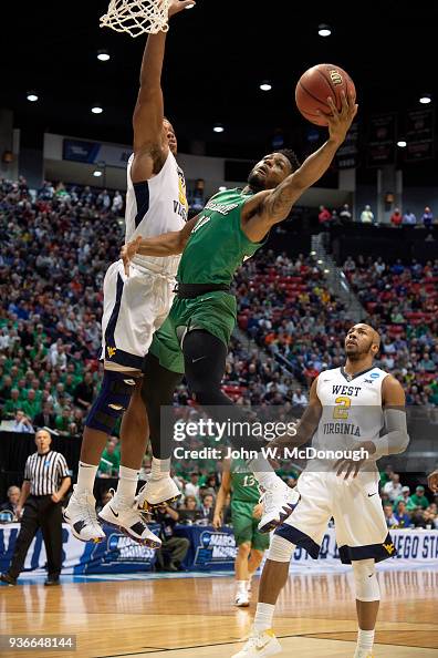 Marshall C.J. Burks in action vs West Virginia Brandon Knapper at ...