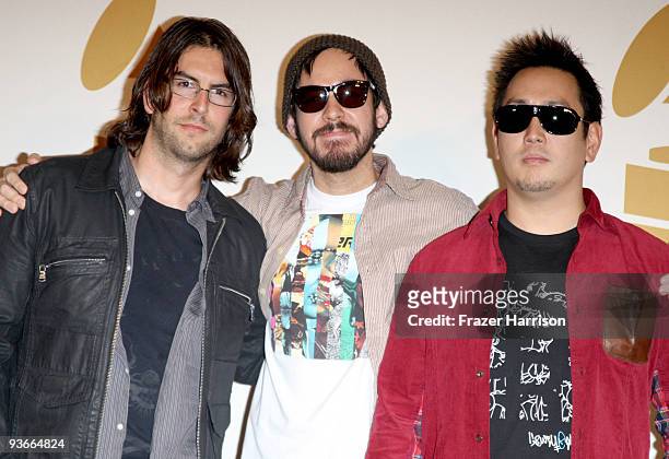 Musicians Rob Bourdon , Mike Shinoda and Joe Hahn of Linkin Park pose in the press room during The GRAMMY Nominations Concert Live! at the Club Nokia...