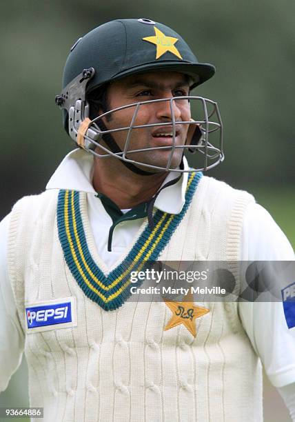 Shoaib Malik of Pakistan walks from the field after being caught out by Daniel vettori captain of the Blackcaps during day one of the Second Test...