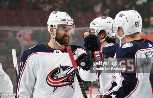 Nick Foligno and Markus Nutivaara of the Columbus Blue Jackets celebrate after defeating the Philadelphia Flyers 5-3 on March 15, 2018 at the Wells...