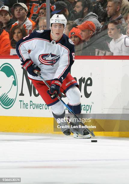 Zach Werenski of the Columbus Blue Jackets skates the puck against the Philadelphia Flyers on March 15, 2018 at the Wells Fargo Center in...