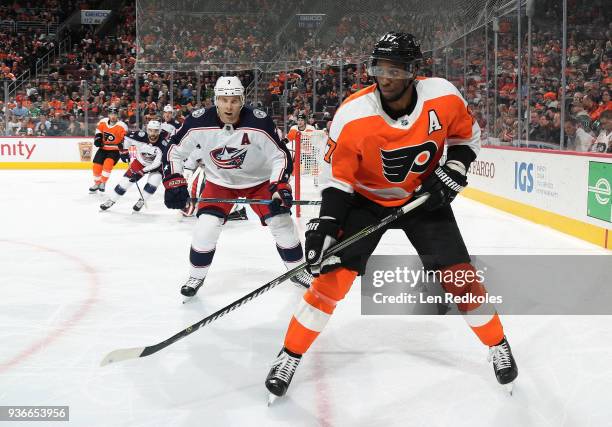 Wayne Simmonds of the Philadelphia Flyers in action against Jack Johnson of the Columbus Blue Jackets on March 15, 2018 at the Wells Fargo Center in...