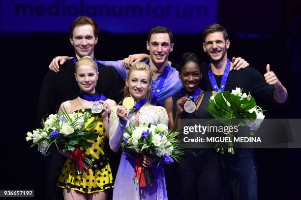 Silver medal Russia's Evgenia Tarasova and Vladimir Morozow, Gold medal Germany's Aljona Savchenko and Bruno Massot and Bronze medal France's Vanessa...