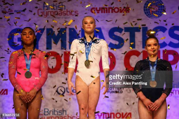 Silver medalist Margzetta Frazier of The United States, gold medalist, Angelina Melnikova of Russia and bronze medalist Alice Kinsella of Great...