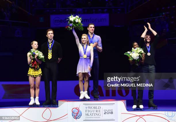 Silver medal Russia's Evgenia Tarasova and Vladimir Morozow, Gold medal Germany's Aljona Savchenko and Bruno Massot and Bronze medal France's Vanessa...