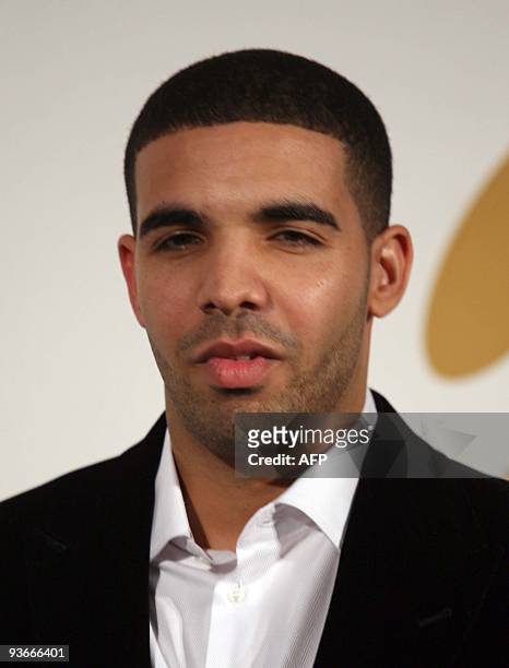 Drake poses at the Grammy Nominations Concert in Los Angeles on December 2, 2009. The 52 annual Grammy Awards will take place on January 3, 2010....