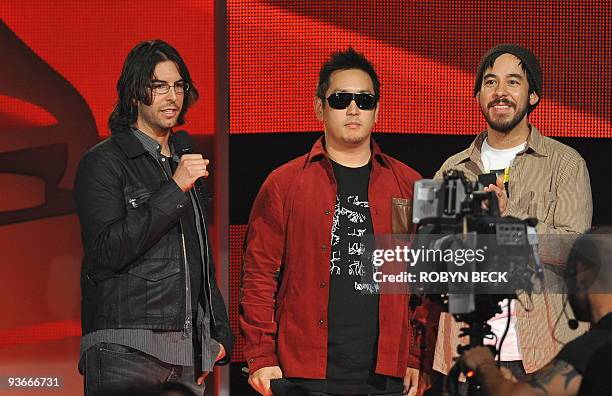 Musicians Rob Bourdon , Joe Hahn , and Mike Shinoda of Linkin Park announce the nominees in the "Pop Performance by a Duo or Group with Vocals"...