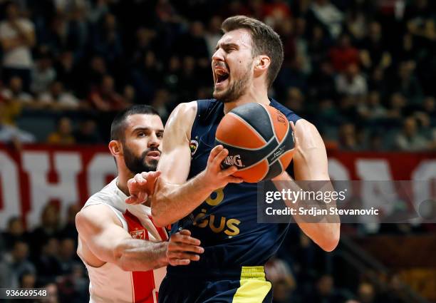 Marko Guduric of Fenerbahce is challenged by Branko Lazic of Crvena Zvezda during the 2017/2018 Turkish Airlines EuroLeague Regular Season Round 28...