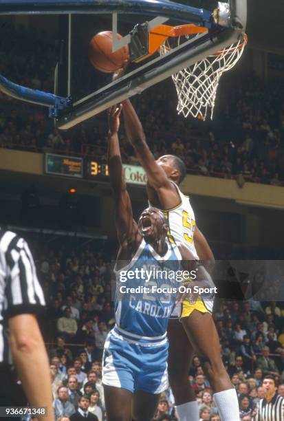 Michael Jordan of the North Carolina Tar Heels goes in for a layup against the Wake Forest Demon Deacons during an NCAA basketball game February 17,...