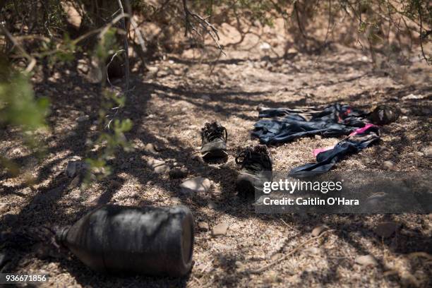 Aguílas del Desierto search and rescue crew recovered water jugs and clothing from a migrant attempting to cross from Mexico into the United States...