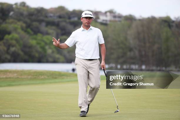 Chez Reavie of the United States reacts on the 14th green during the second round of the World Golf Championships-Dell Match Play at Austin Country...