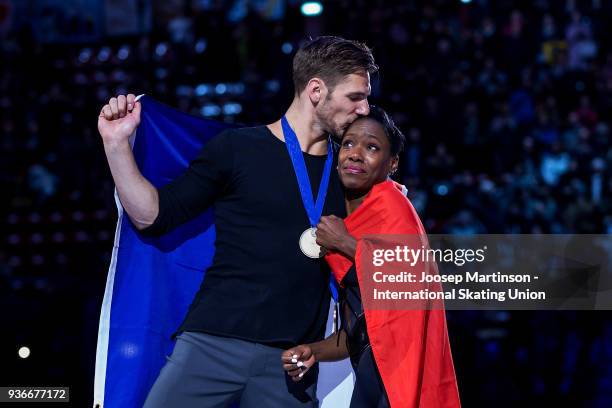 Vanessa James and Morgan Cipres of France react in the Pairs medal ceremony during day two of the World Figure Skating Championships at Mediolanum...