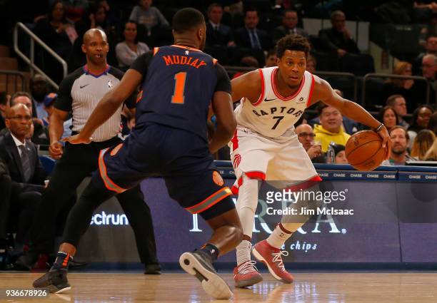 Kyle Lowry of the Toronto Raptors in action against Emmanuel Mudiay of the New York Knicks at Madison Square Garden on March 11, 2018 in New York...