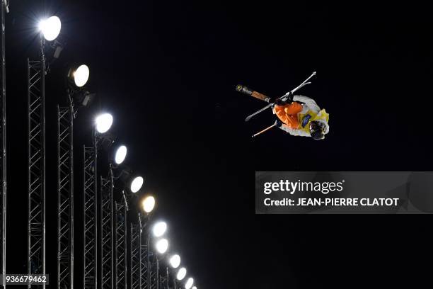 Alex Ferreira competes in the men's ski superpipe final of the Ultimate Ears Freestyle Tour, final of the World Cup, in the French Alpine resort of...