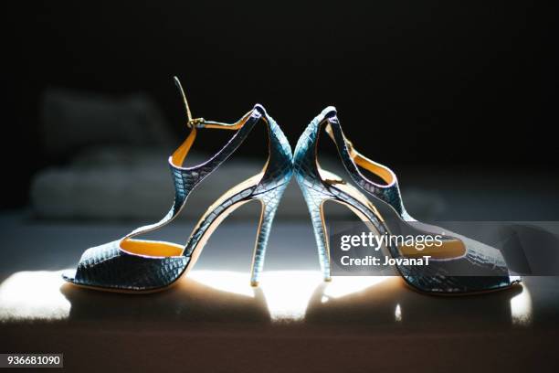 brides lovely blue high heels on sunlight - jovanat stock pictures, royalty-free photos & images