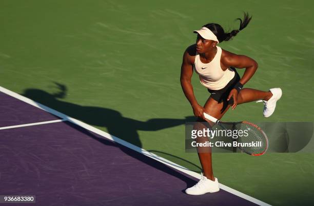 Sloane Stephens of the United States serves against Ajla Tomljanovic of Australia in their second round match during the Miami Open Presented by Itau...